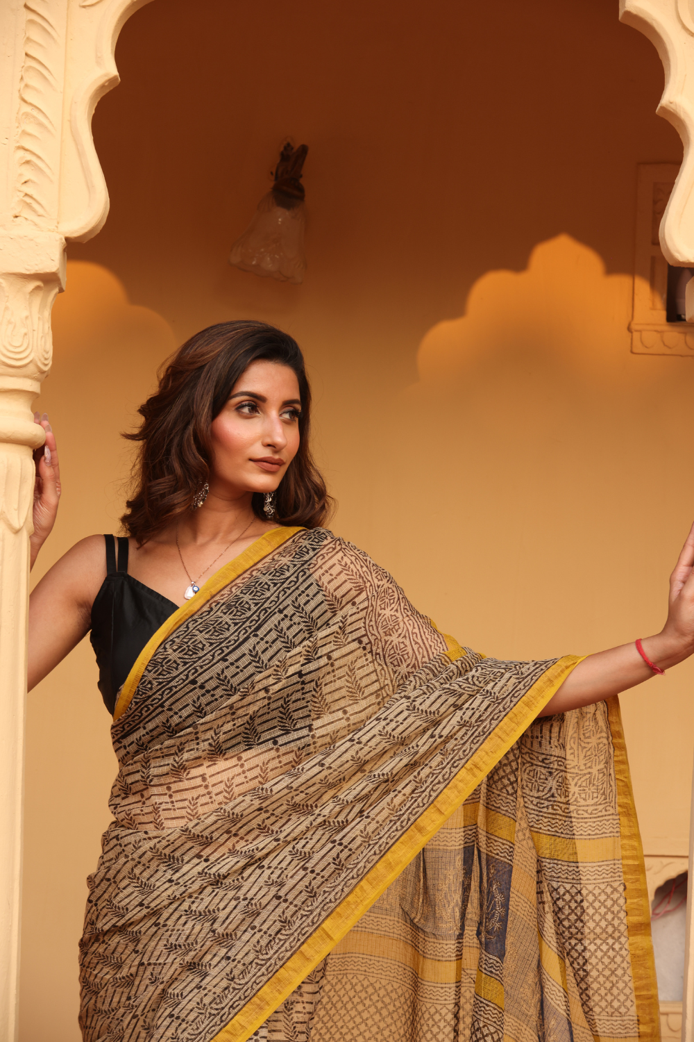 Elegant Soft Black Kota Doria Saree with Yellow Border – Timeless Appeal