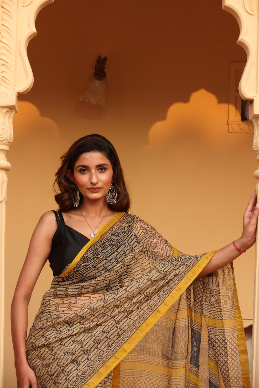 Elegant Soft Black Kota Doria Saree with Yellow Border – Timeless Appeal
