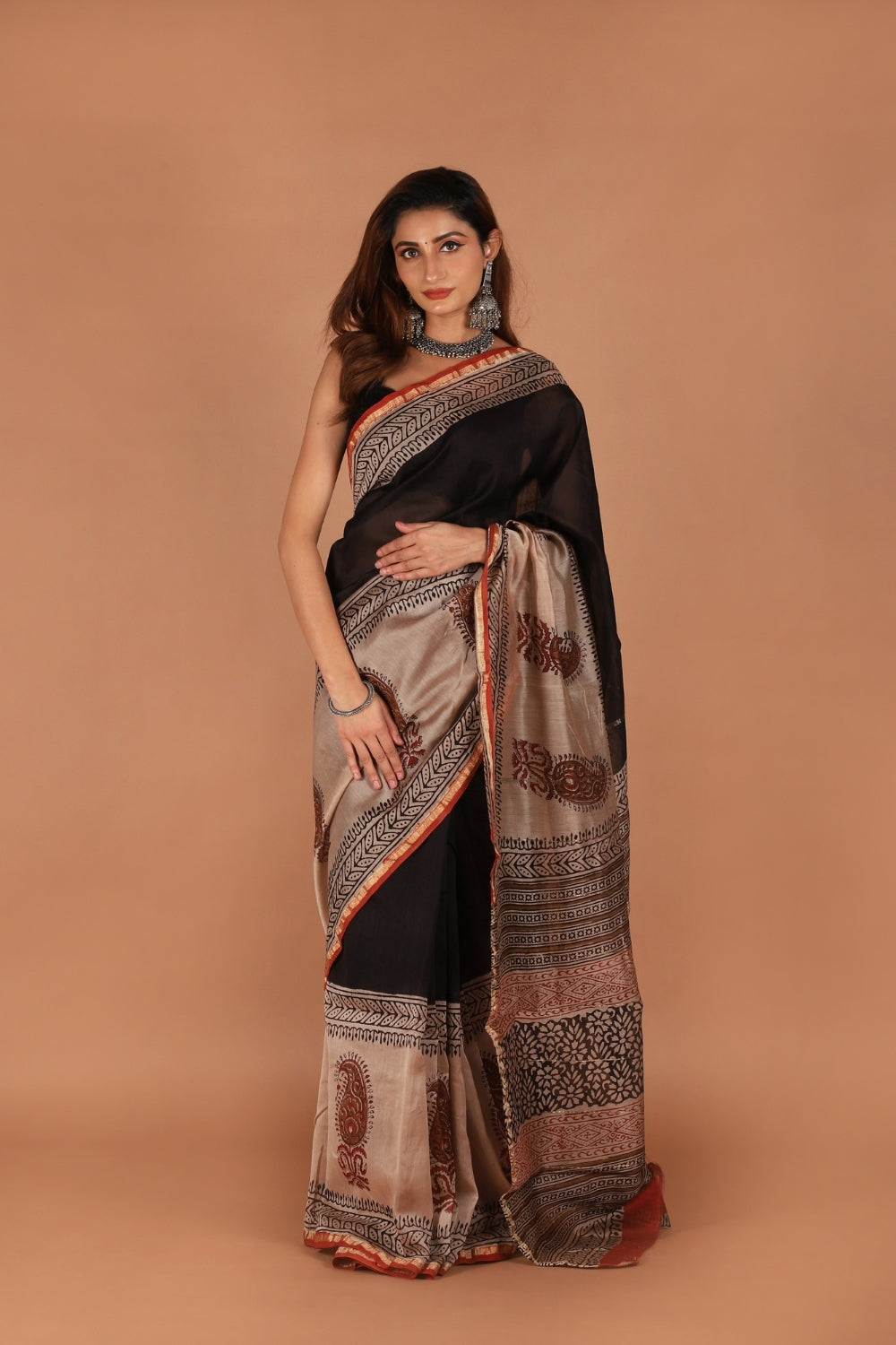 Hand block printed black and beige Chanderi saree with paisley motifs