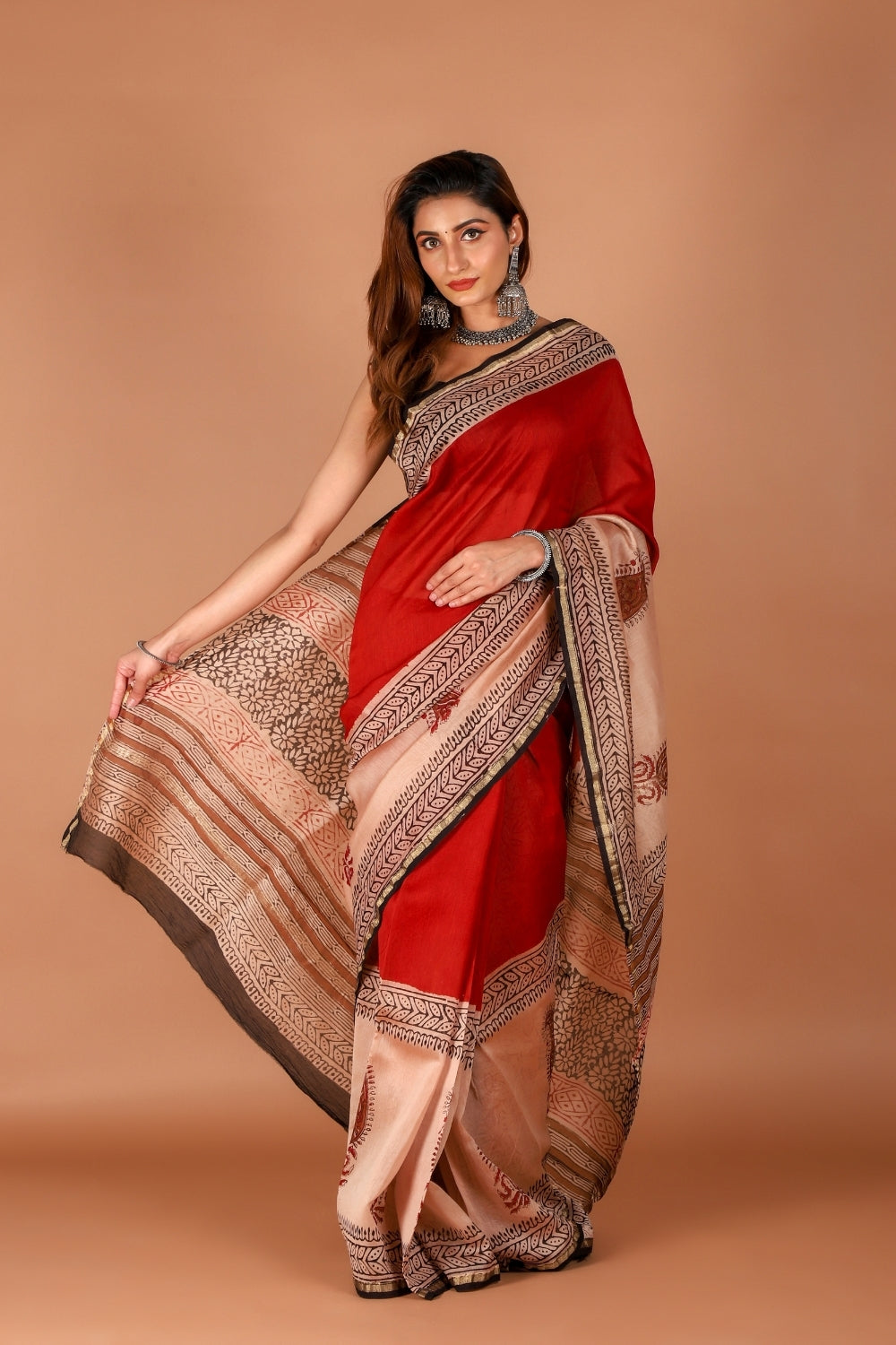 Model showcasing classic ivory Chanderi silk saree with intricate hand block prints