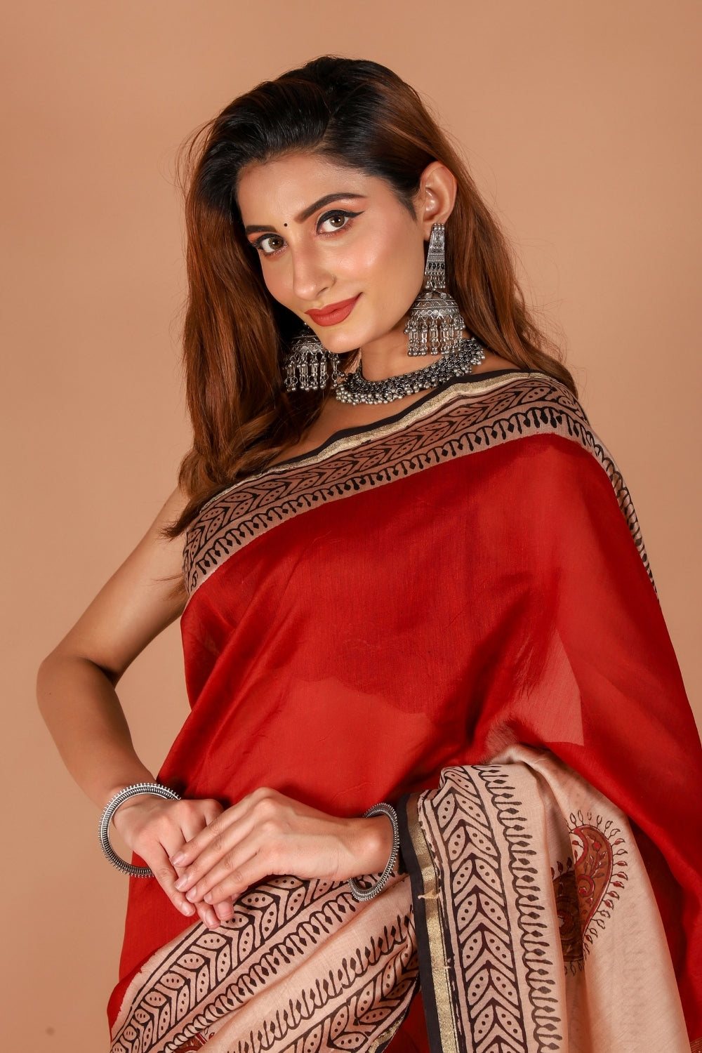 Model showcasing classic ivory Chanderi silk saree with intricate hand block prints
