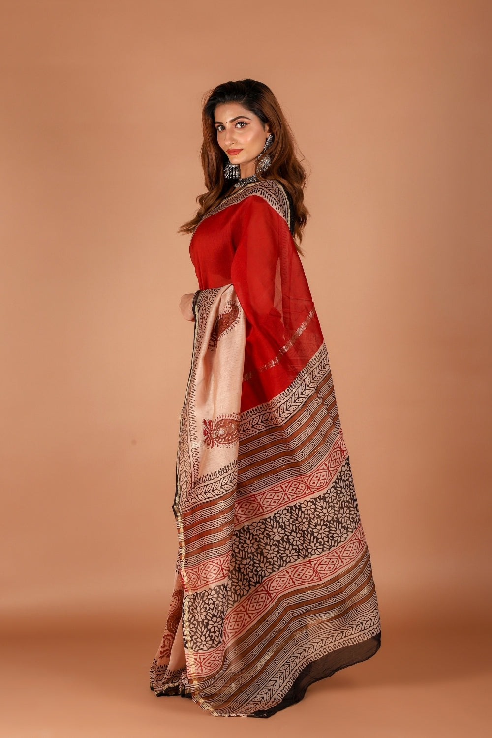 Model showcasing classic ivory Chanderi silk saree with intricate hand block prints